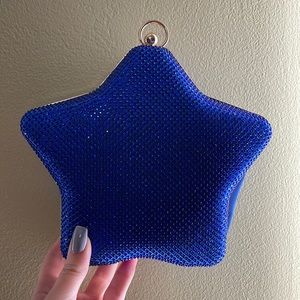 Gorgeous clutch star shaped purse.